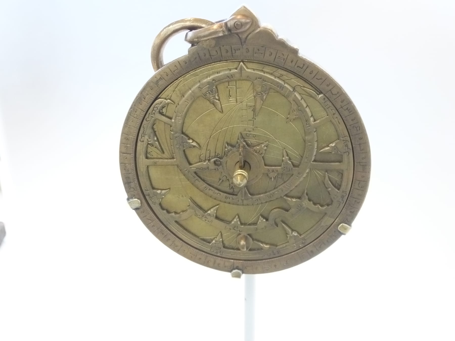 A brass astrolabe made in Damascus in 1230 CE, showing the detailed star pointers and zodiac ring.
